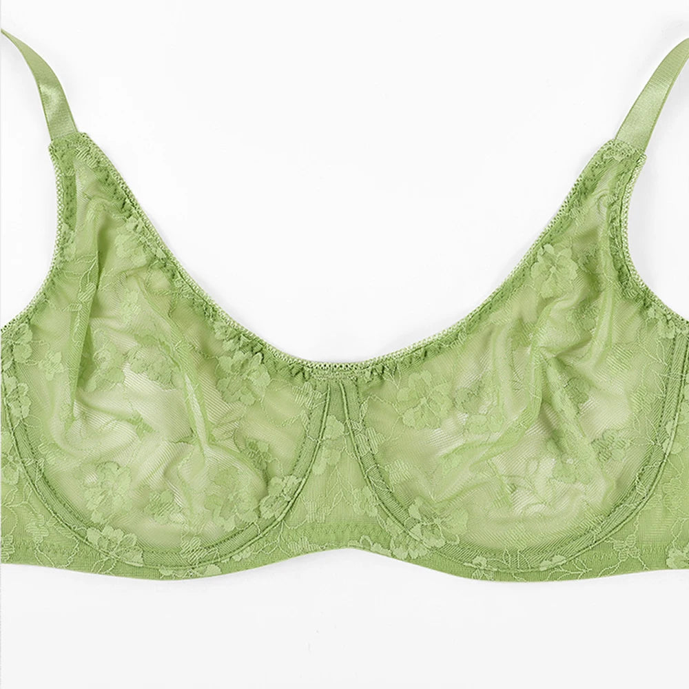 Green lace underwire bra close-up, floral cup detailing and scalloped lace edge