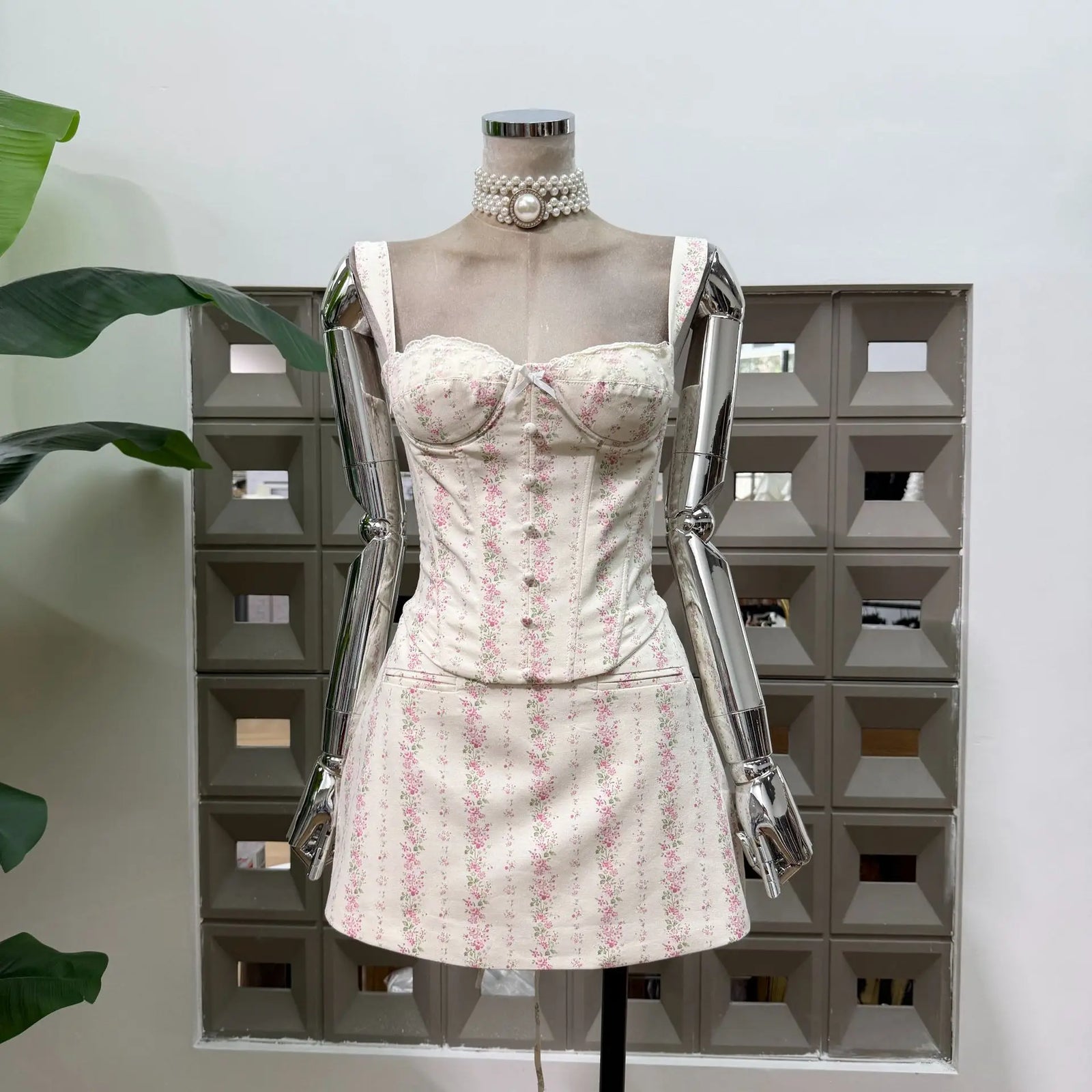 Pink floral print mini skirt set with corset bodice and straight mini skirt