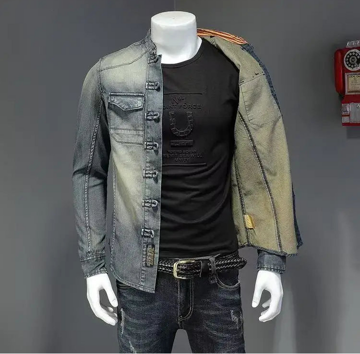 Men’s light blue denim shirt front view over black T-shirt; button placket and pockets