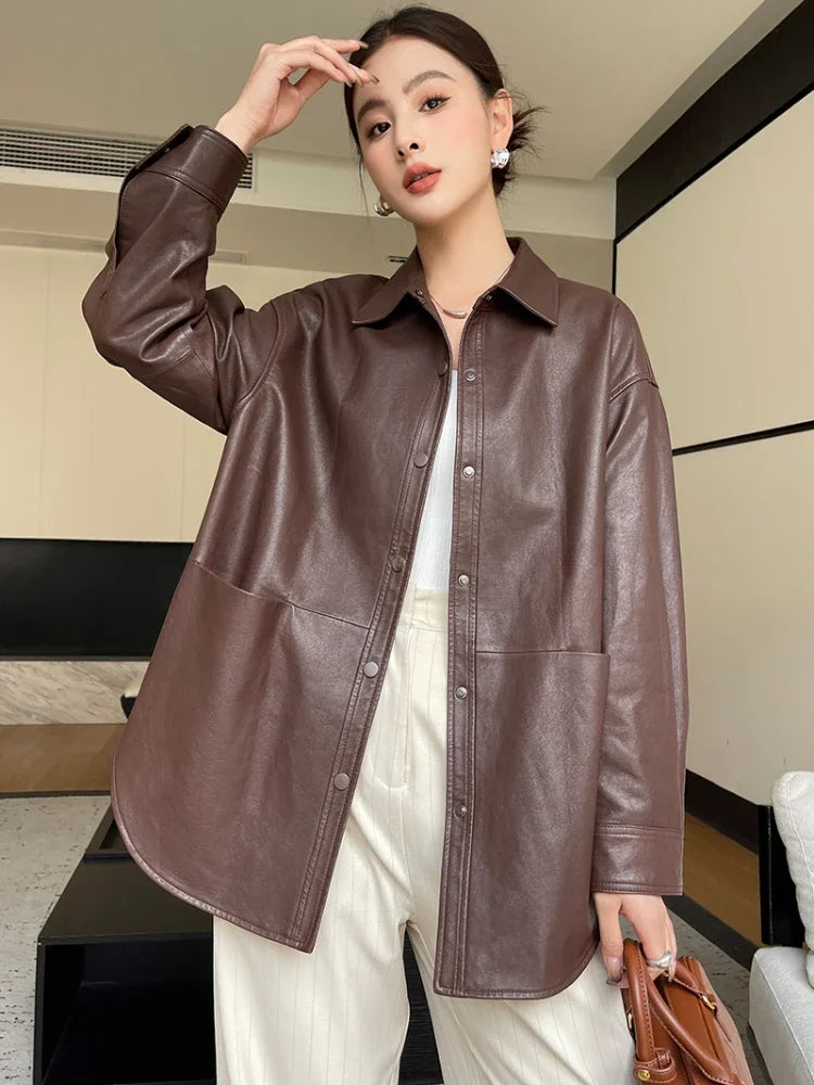 Wine brown leather shirt jacket with pointed collar, button front, chest pockets, buttoned cuffs