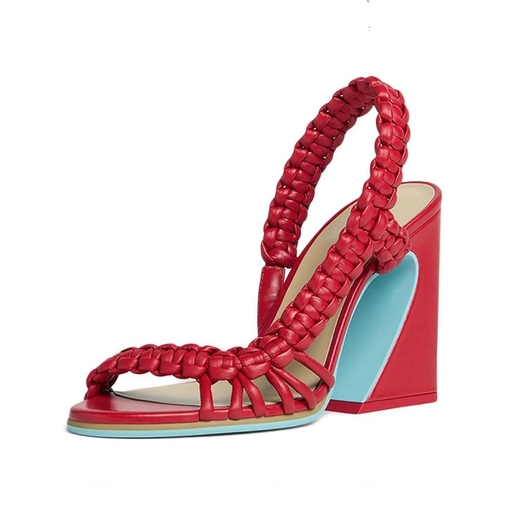 Red woven high heel sandals with crisscross braided straps and block heel