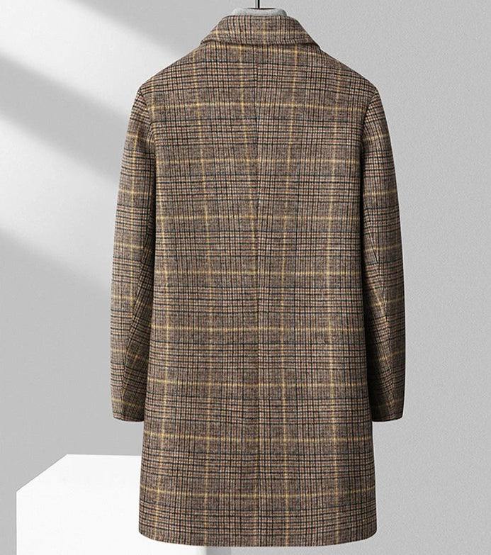 Plaid patterned coat on a gray background