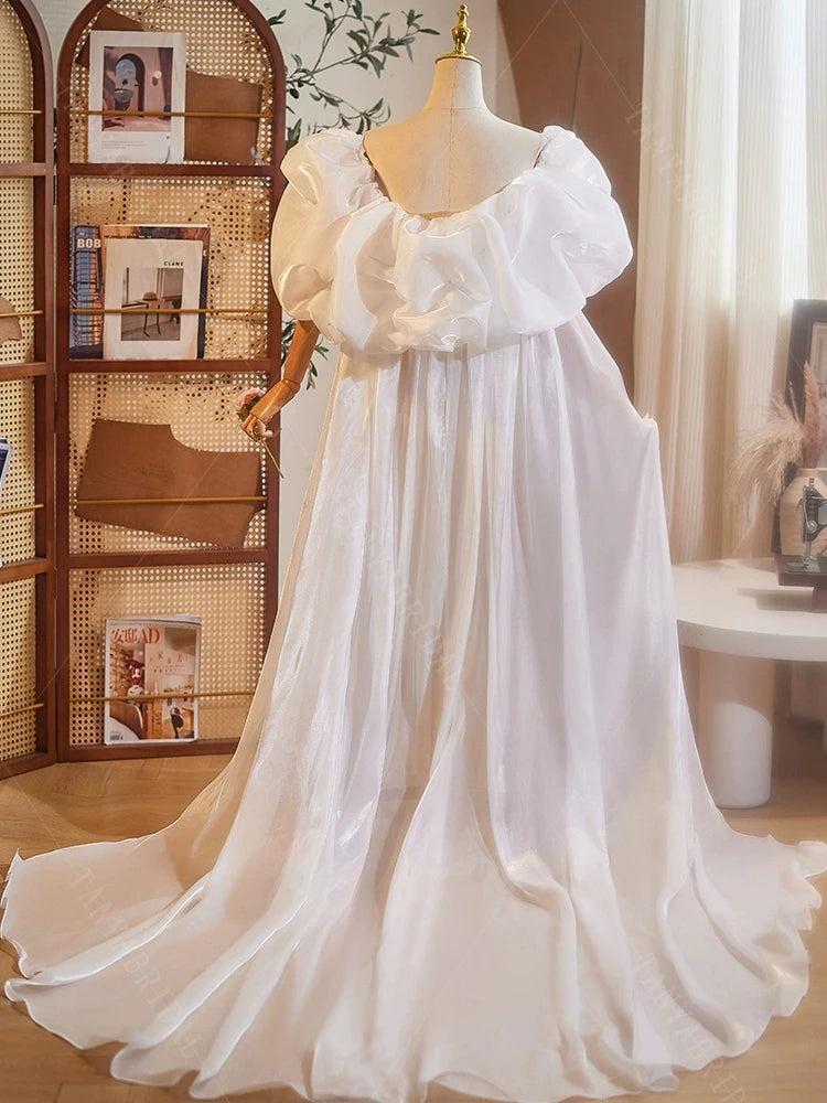 Ivory organza bridal cape, off-shoulder look with puff sleeves and flowing back