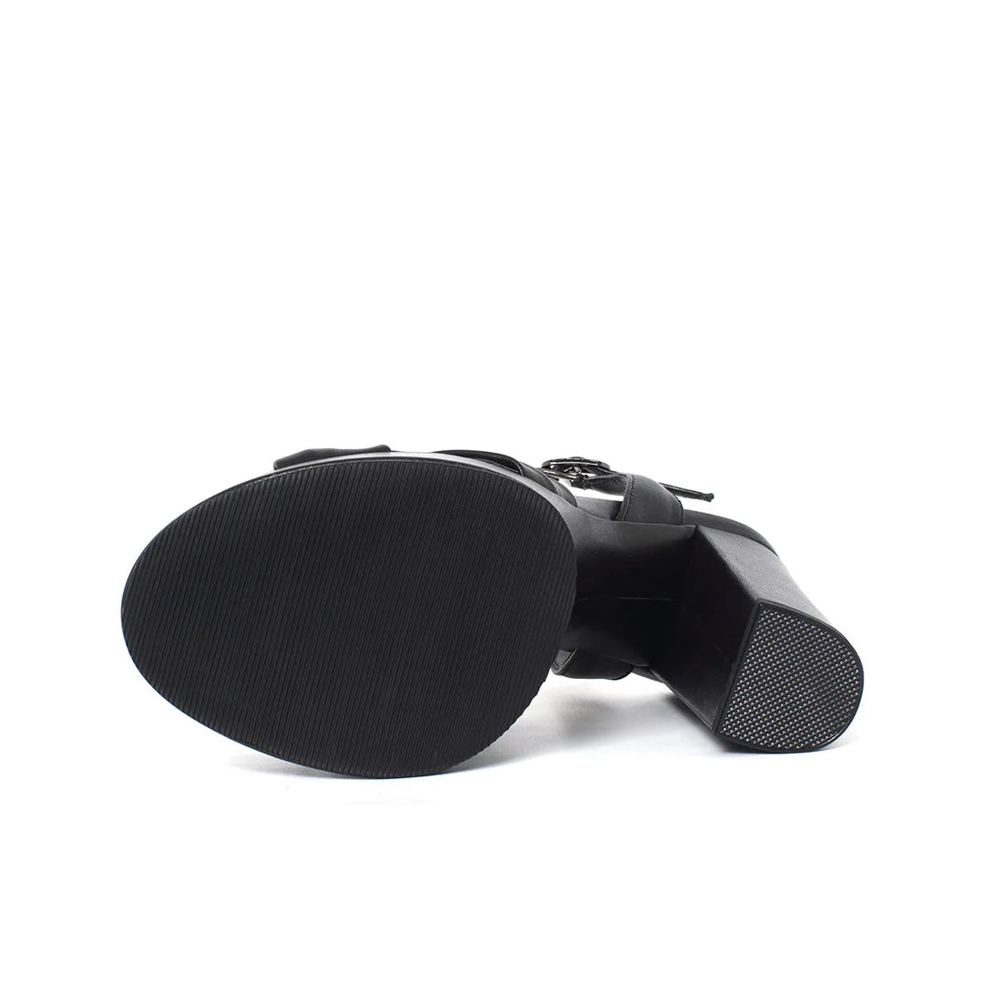 Black platform sandal outsole with textured tread and strap hardware