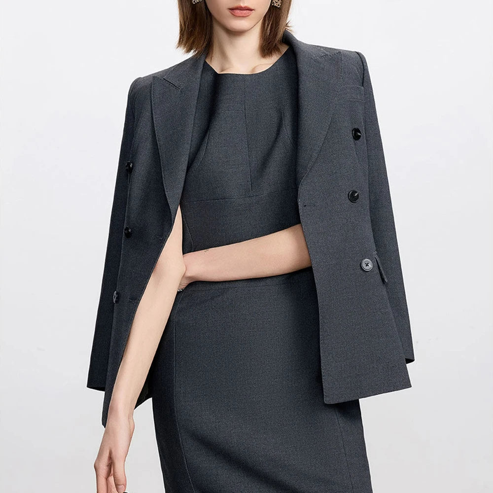 Dark gray two-piece skirt suit, blazer and pencil skirt with button details