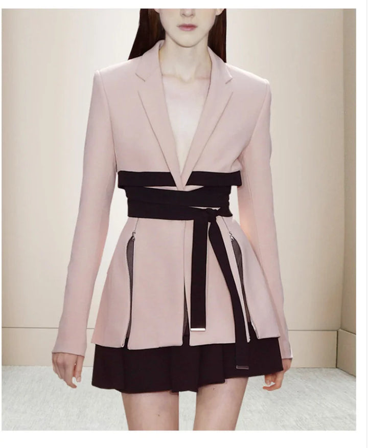 Women’s pink cropped blazer and black-belt pleated skirt set