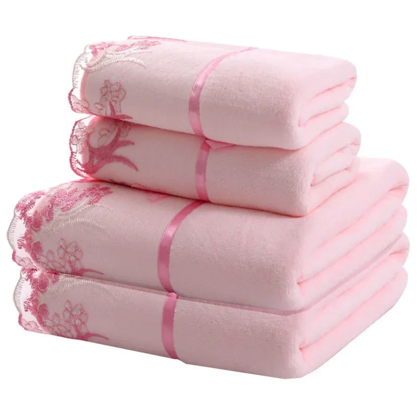 Pink lace-pattern microfiber towels, neatly folded in a three-stack