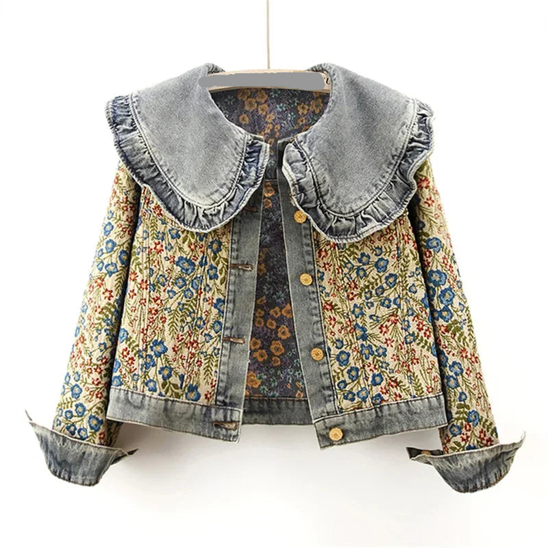 Floral patterned jacket with denim collar on a white background