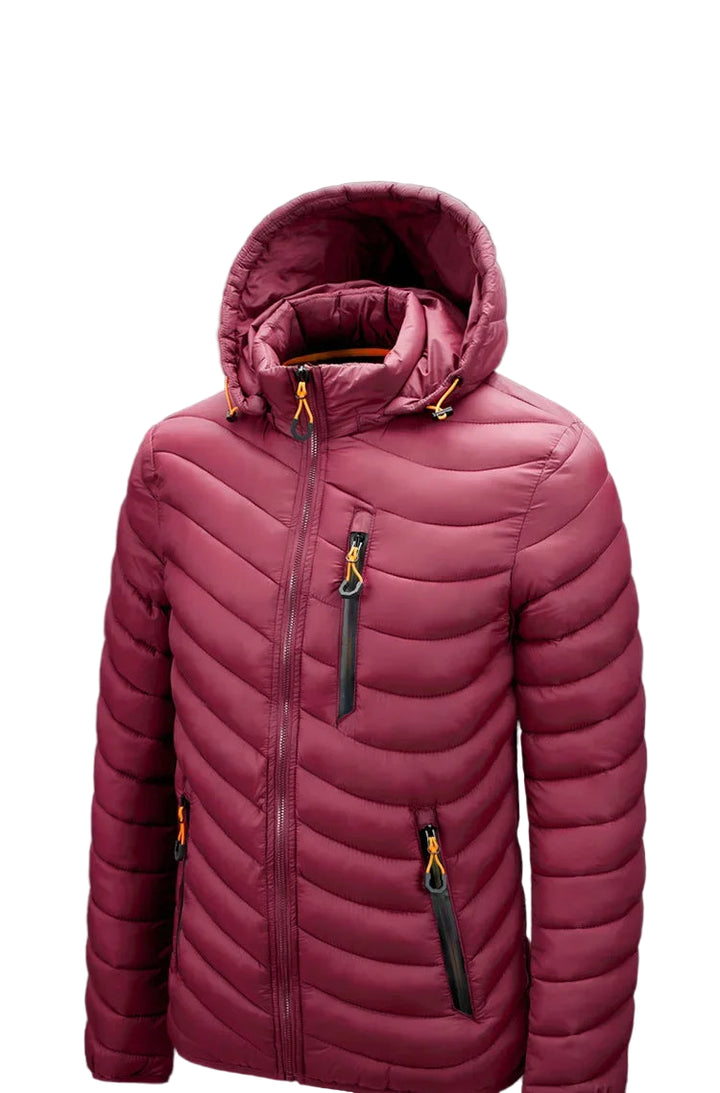 Pink puffer jacket with a hood on a black background