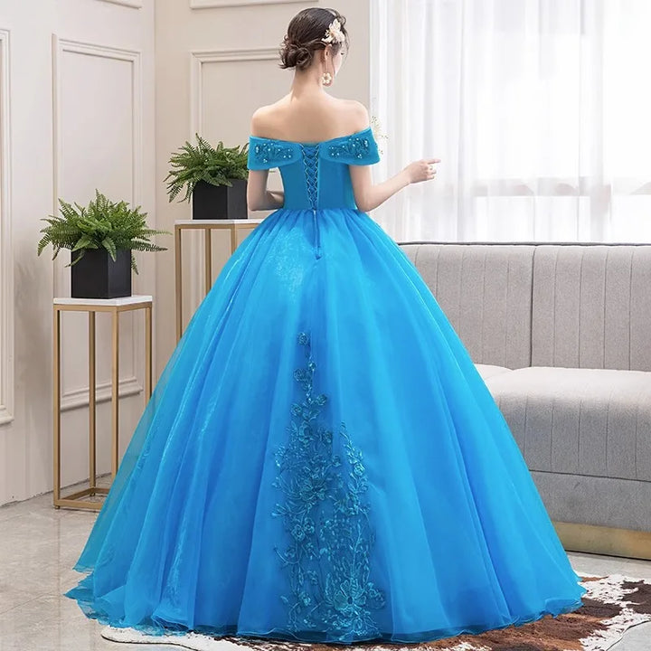 Lake blue off-shoulder party dress viewed from back with full tulle skirt
