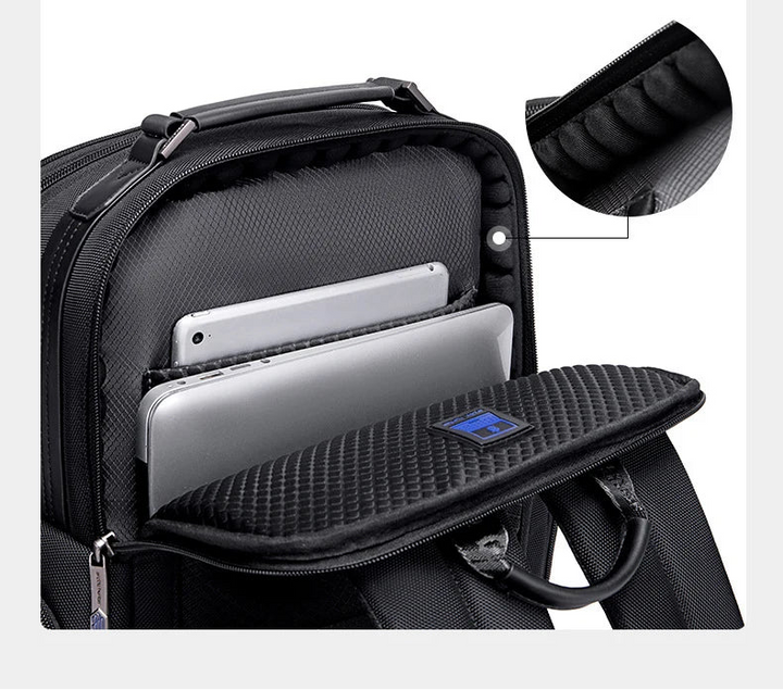 Black backpack with padded shockproof computer compartment and open zipper pocket
