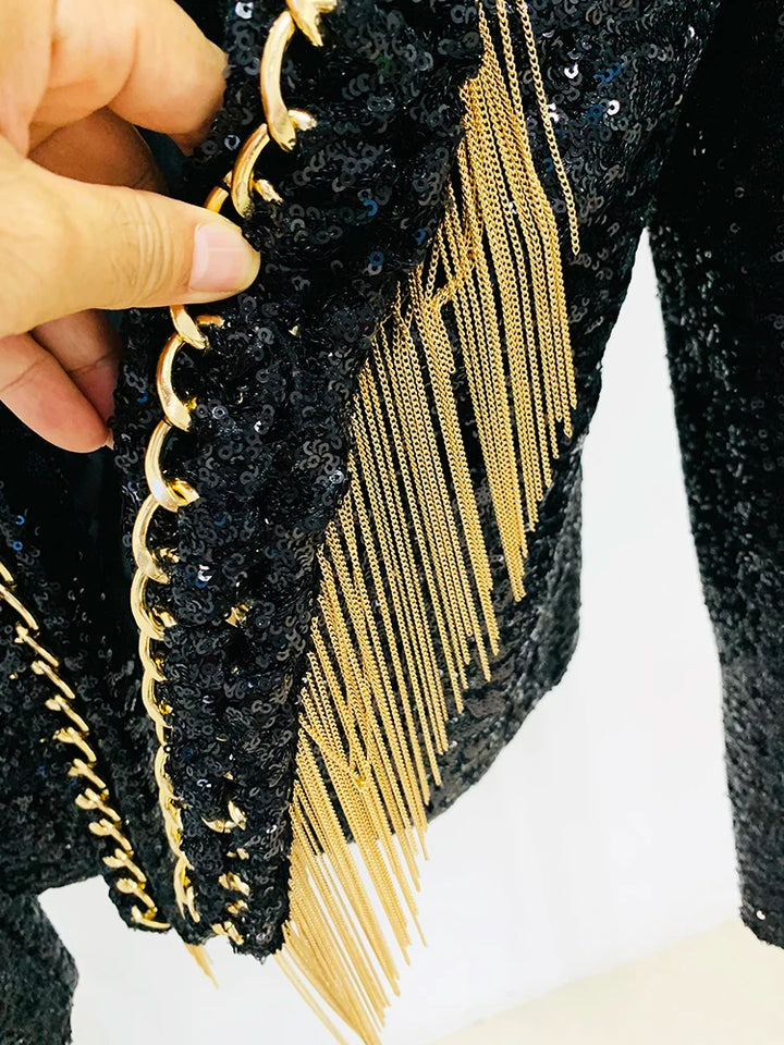 Black sequined jacket edge with gold chain trim and long fringe tassels
