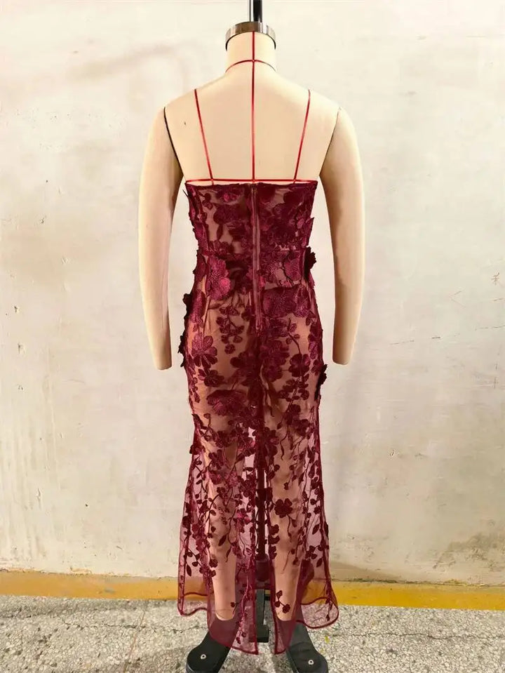 Burgundy 3D floral lace gown on mannequin, back view with open back design