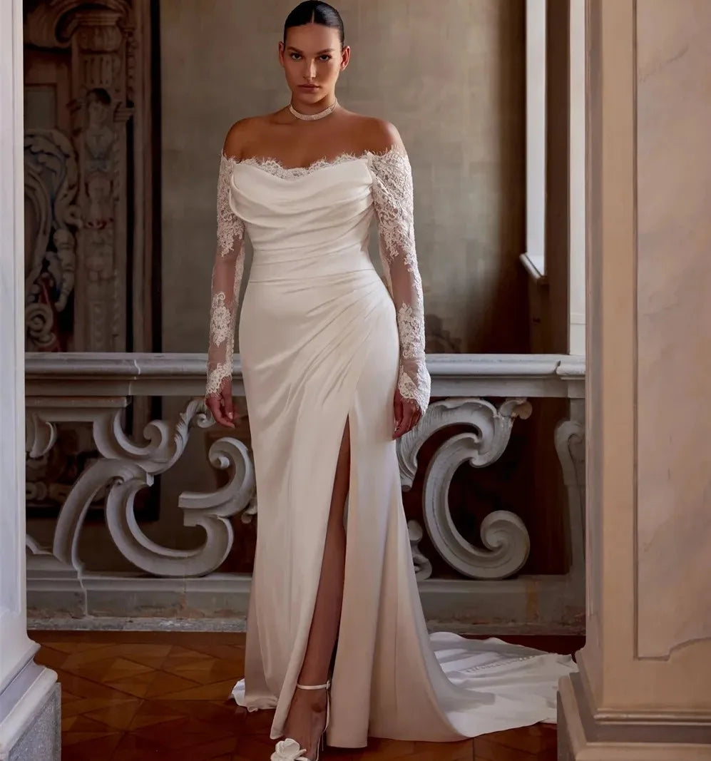 Ivory-white satin bride gown with lace long sleeves and deep side slit skirt