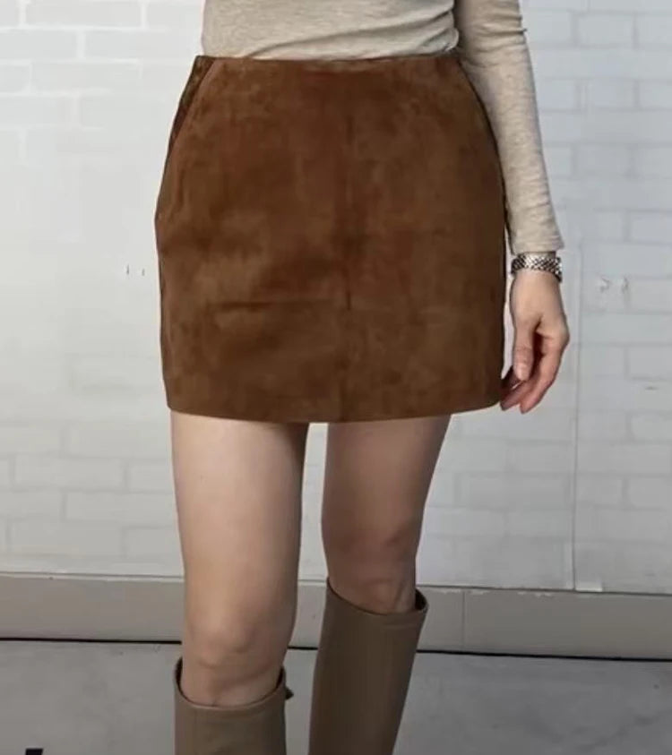Brown suede mini skirt with wide waistband and smooth A-line silhouette