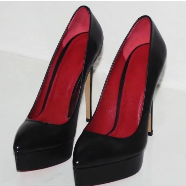 Black pointed-toe high heel pumps with red inner lining