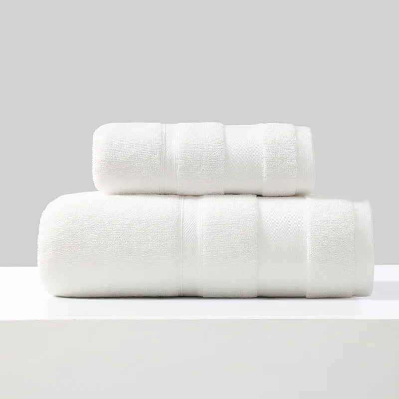 Cotton towel set of 2 in white, folded bath towels stacked