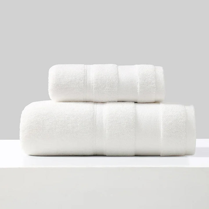 Cotton towel set of 2 in white, folded bath towels stacked