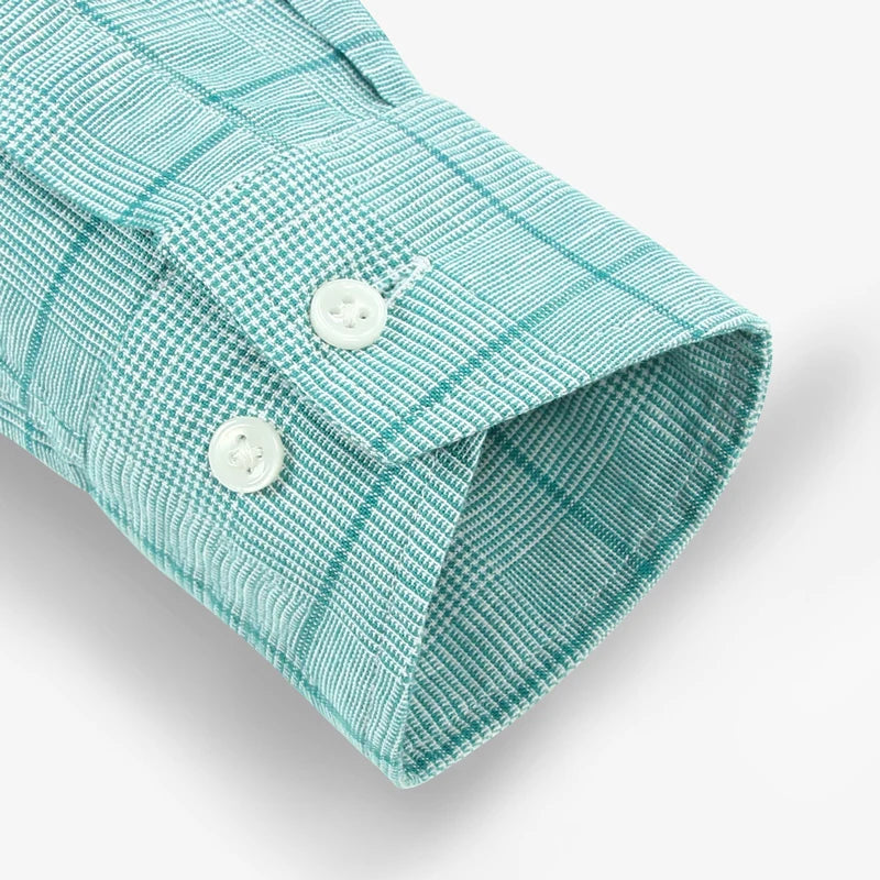 Turquoise plaid linen shirt cuff with two buttons and textured fabric