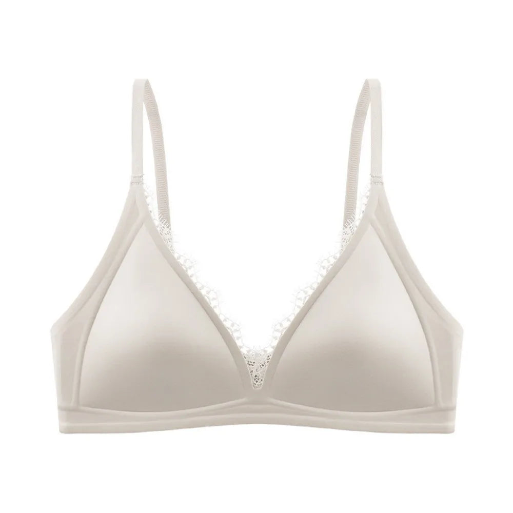Light grey wireless V-neck satin bra with lace trim and seamless, traceless straps.