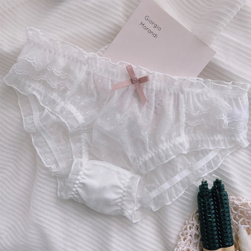White sheer ruffle mid-waist brief with bow on waistband