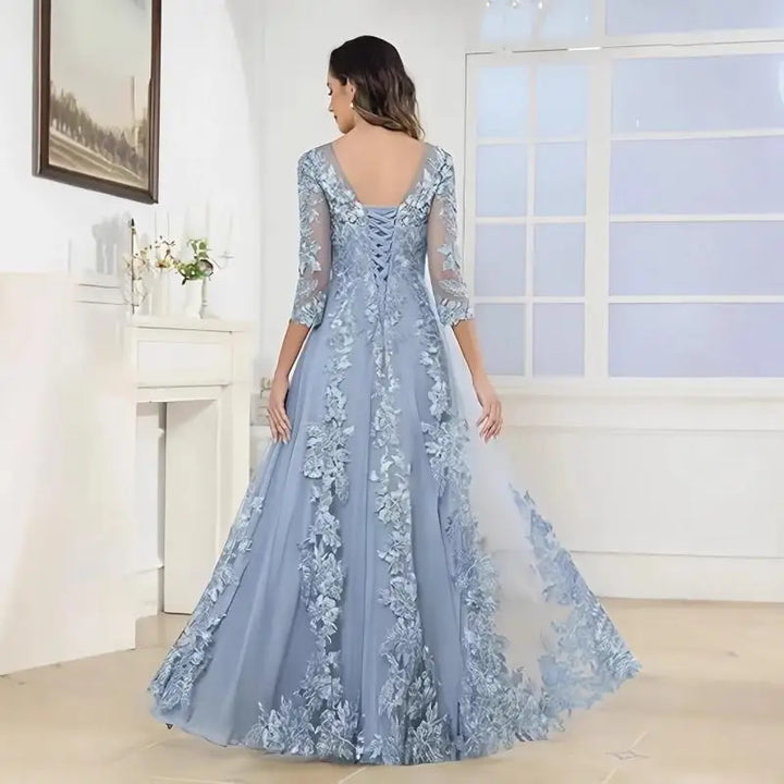 Light blue lace wedding gown back view, low scoop back, 3/4 sleeves, full skirt
