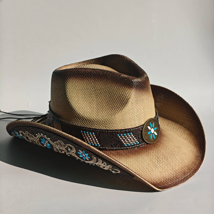 Sand-colored woven cowboy sun hat with dark band, blue bead accents, and flower badge