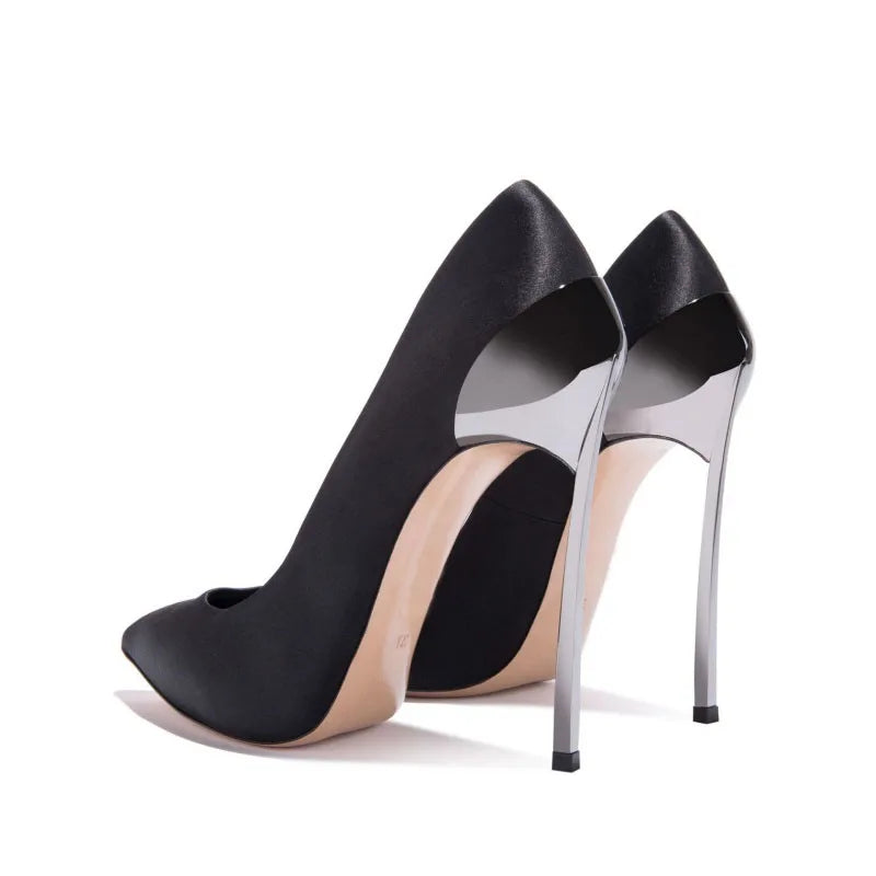 Pair of black pointed-toe slip-on pumps with tall silver stiletto heels