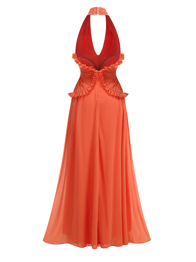 Orange A-line halter dress with ruffled back and flowing skirt