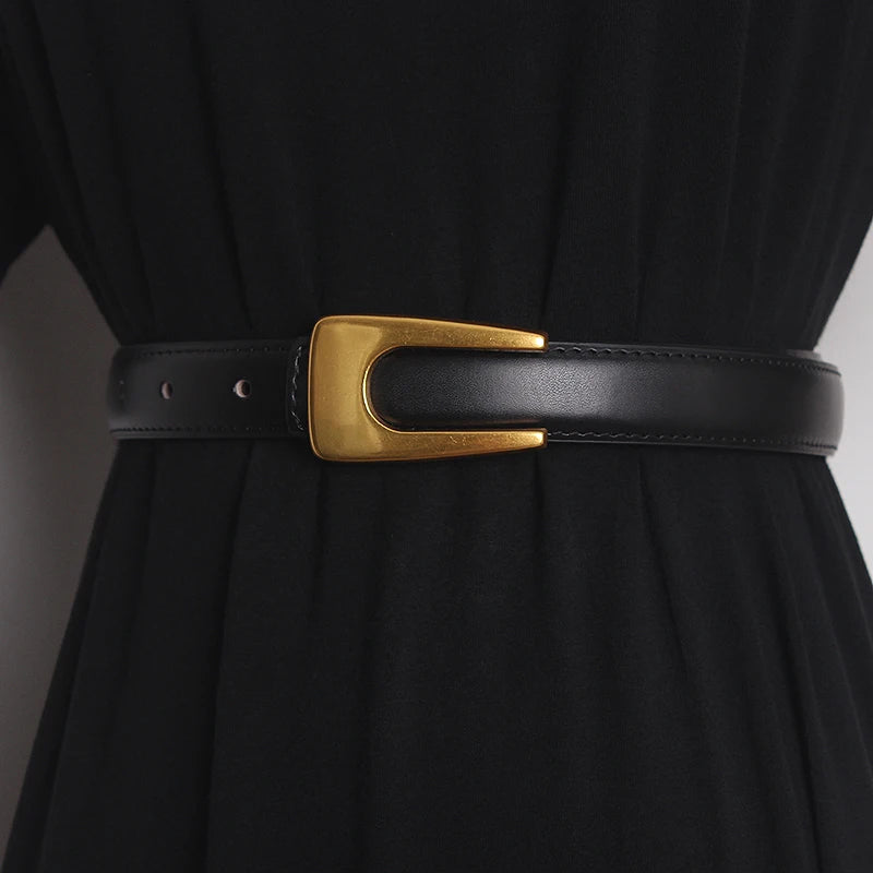 Narrow black leather waist belt with gold-tone rectangular buckle and adjustment holes