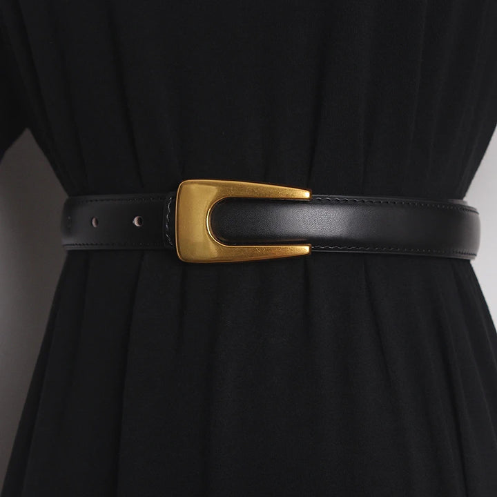 Narrow black leather waist belt with gold-tone rectangular buckle and adjustment holes