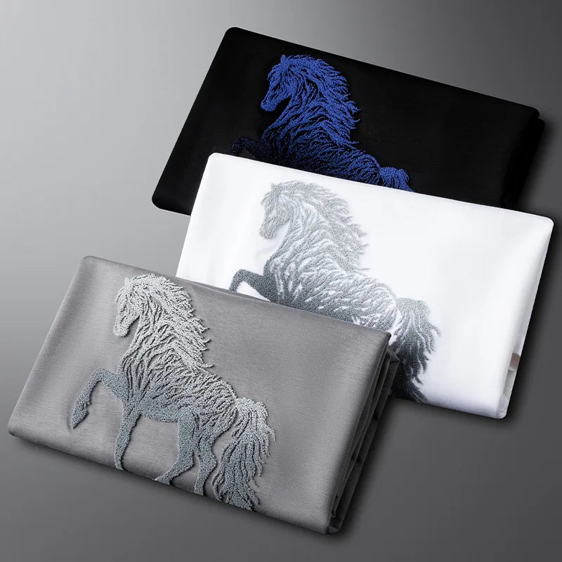 Embroidered T-shirt set: grey, white, and black with horse motifs.