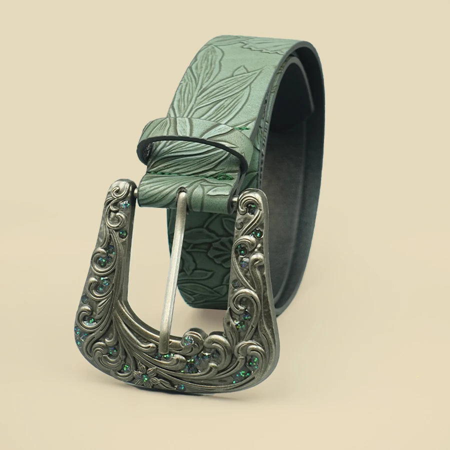 Green leaf-embossed belt with ornate silver buckle, side view