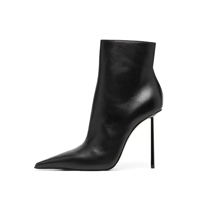Black pointed-toe ankle boots with slim stiletto heel