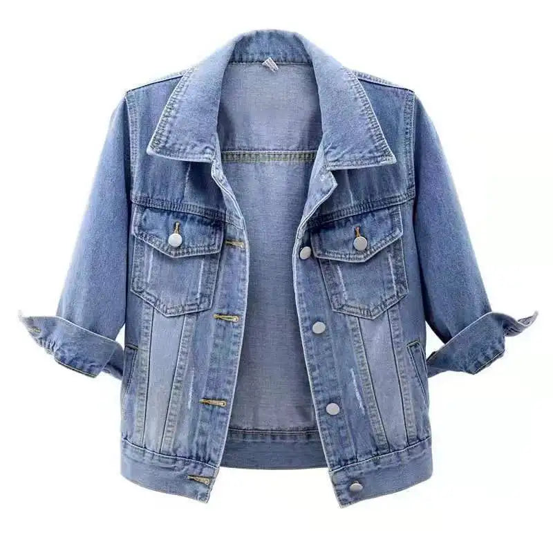 Light blue denim jacket with three-quarter sleeves, button front, and flap pockets