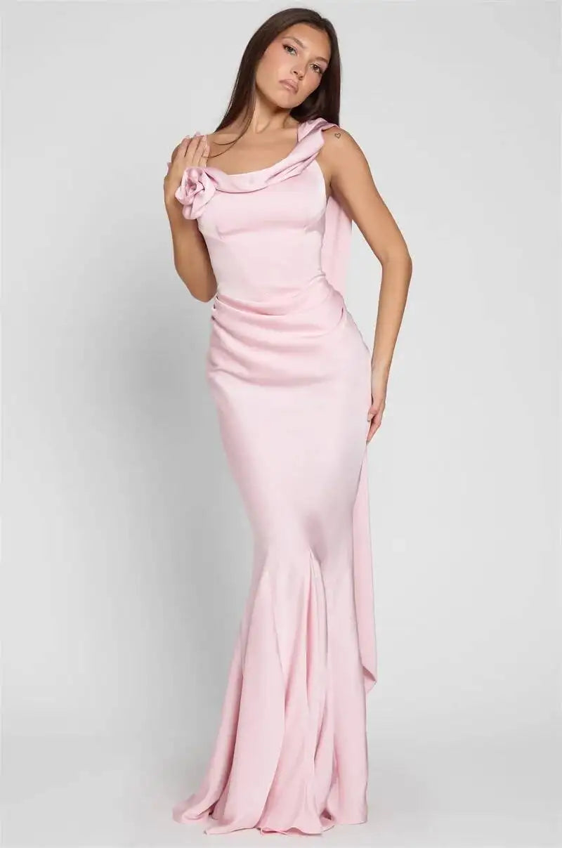 Pink satin ruched fitted maxi dress with draped shoulder and layered bottom