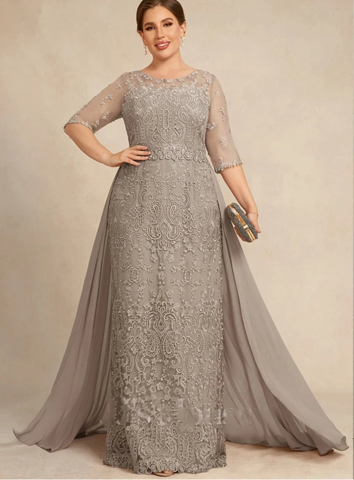 Woman wearing a silver lace evening gown with &