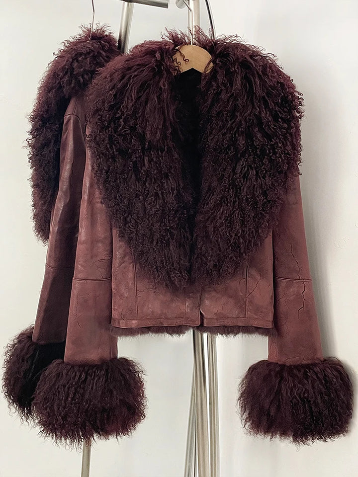 Wine red suede wool coat with shaggy fur collar and fur pom cuffs