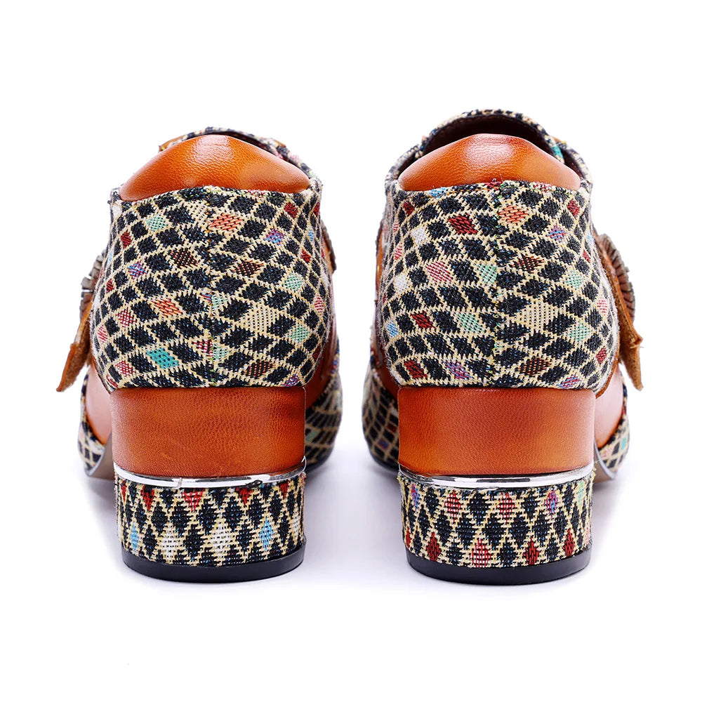 Back view of orange slingback shoes with multicolor woven heel and rear pull-tab details