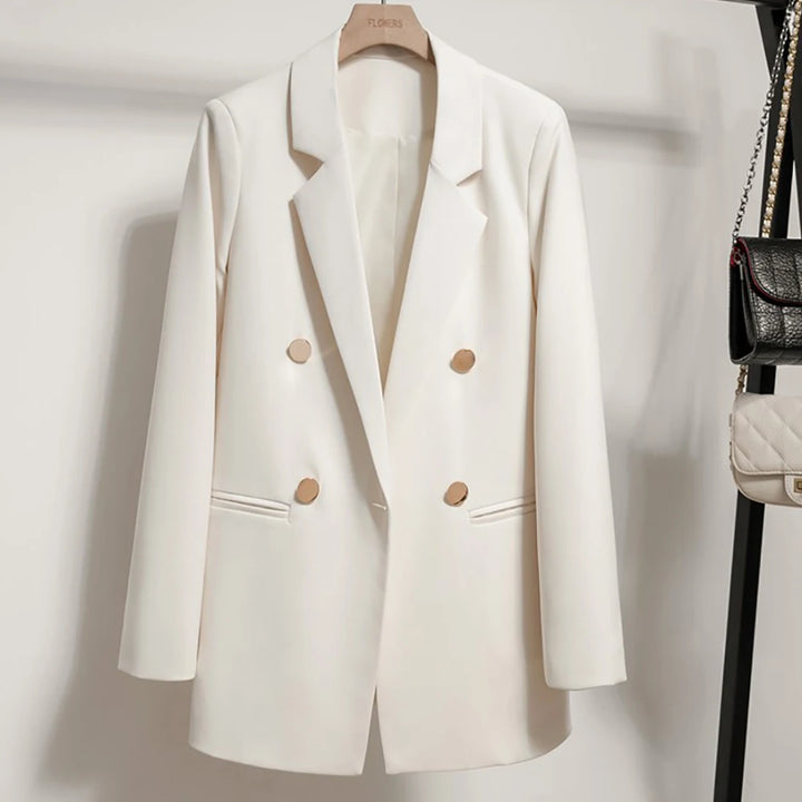 White double-breasted blazer with notched turn-down collar and gold-tone buttons