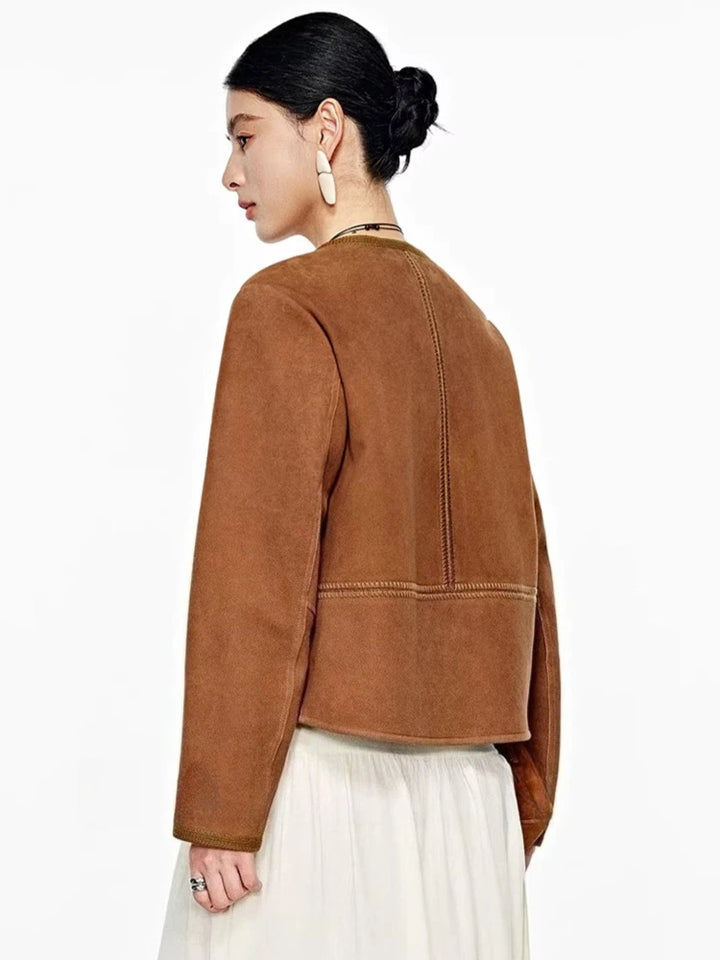 Chocolate brown suede leather jacket back view with yoke and panel seams