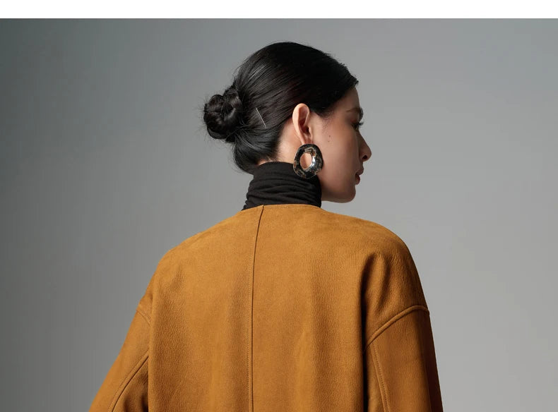 Yellow-brown sheepskin leather jacket back with center seam and high collar
