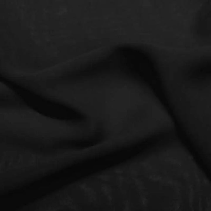 Chiffon midi party gown fabric swatch in dark black, soft draped close-up