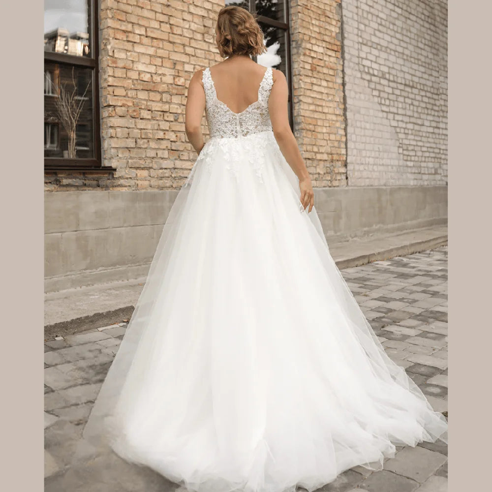 Classic plus size tulle wedding dress, lace bodice and open back, full A-line skirt