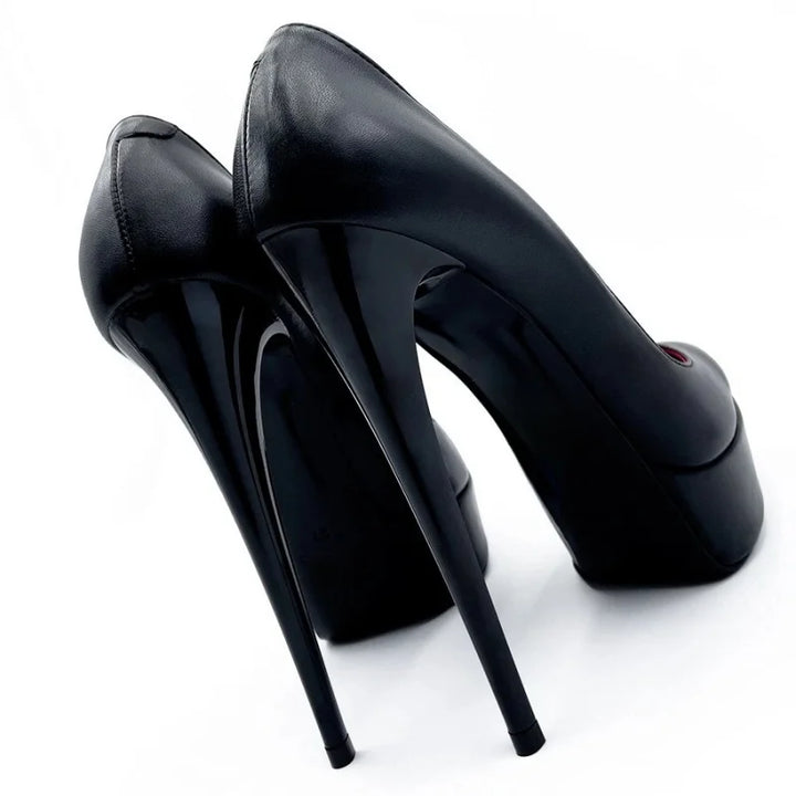 Black pointed-toe platform style high heel pumps with smooth finish
