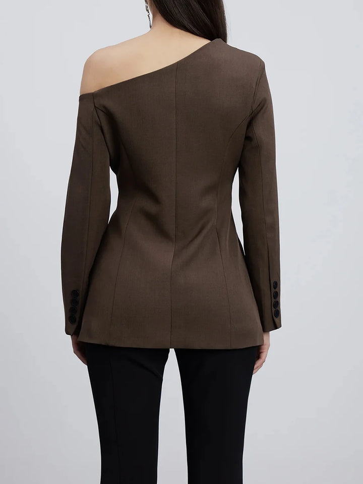 Back view of coffee brown one-shoulder blazer with long sleeves and buttoned cuffs