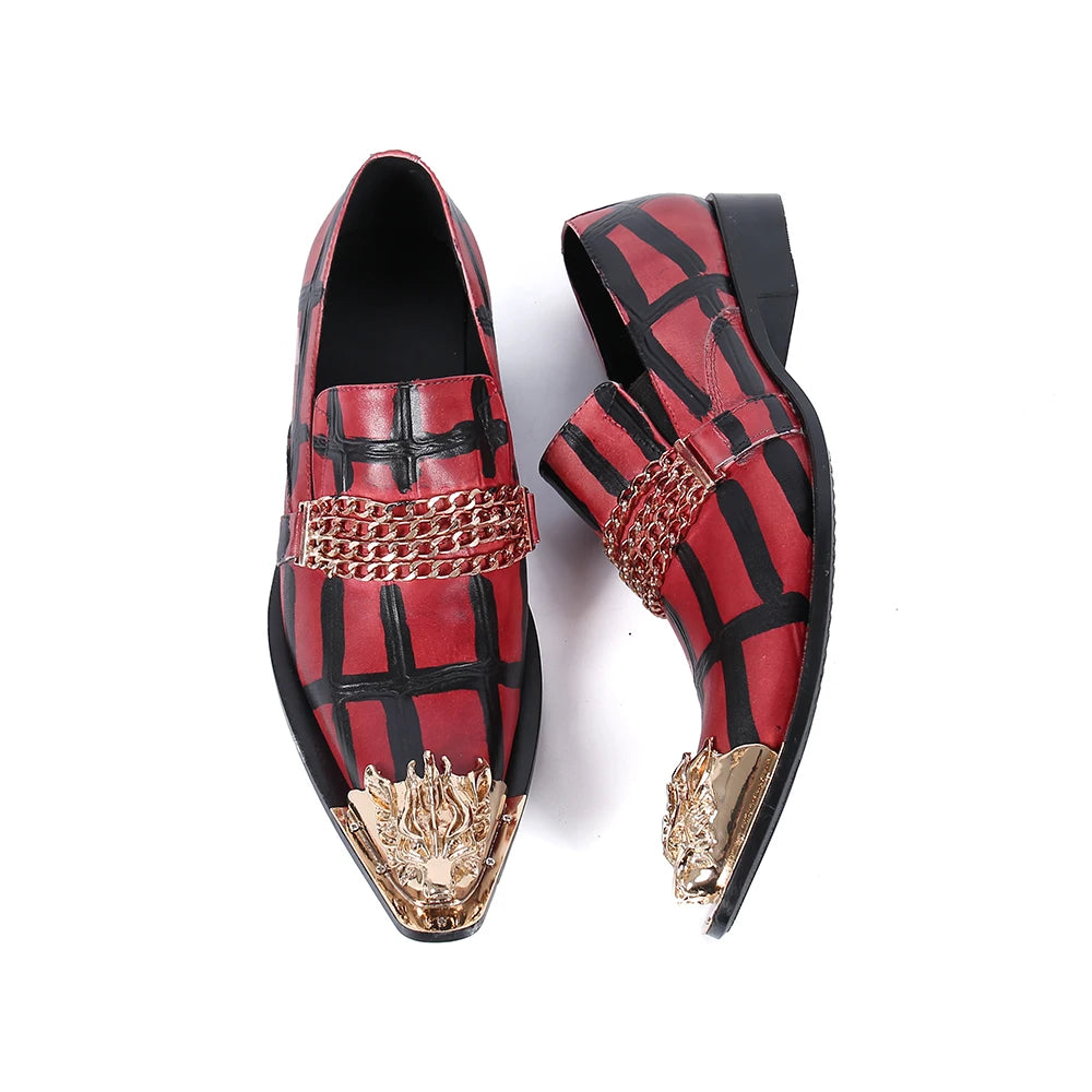Top view of red pointed-toe loafers with black stripes and gold chain front hardware