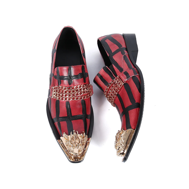 Top view of red pointed-toe loafers with black stripes and gold chain front hardware