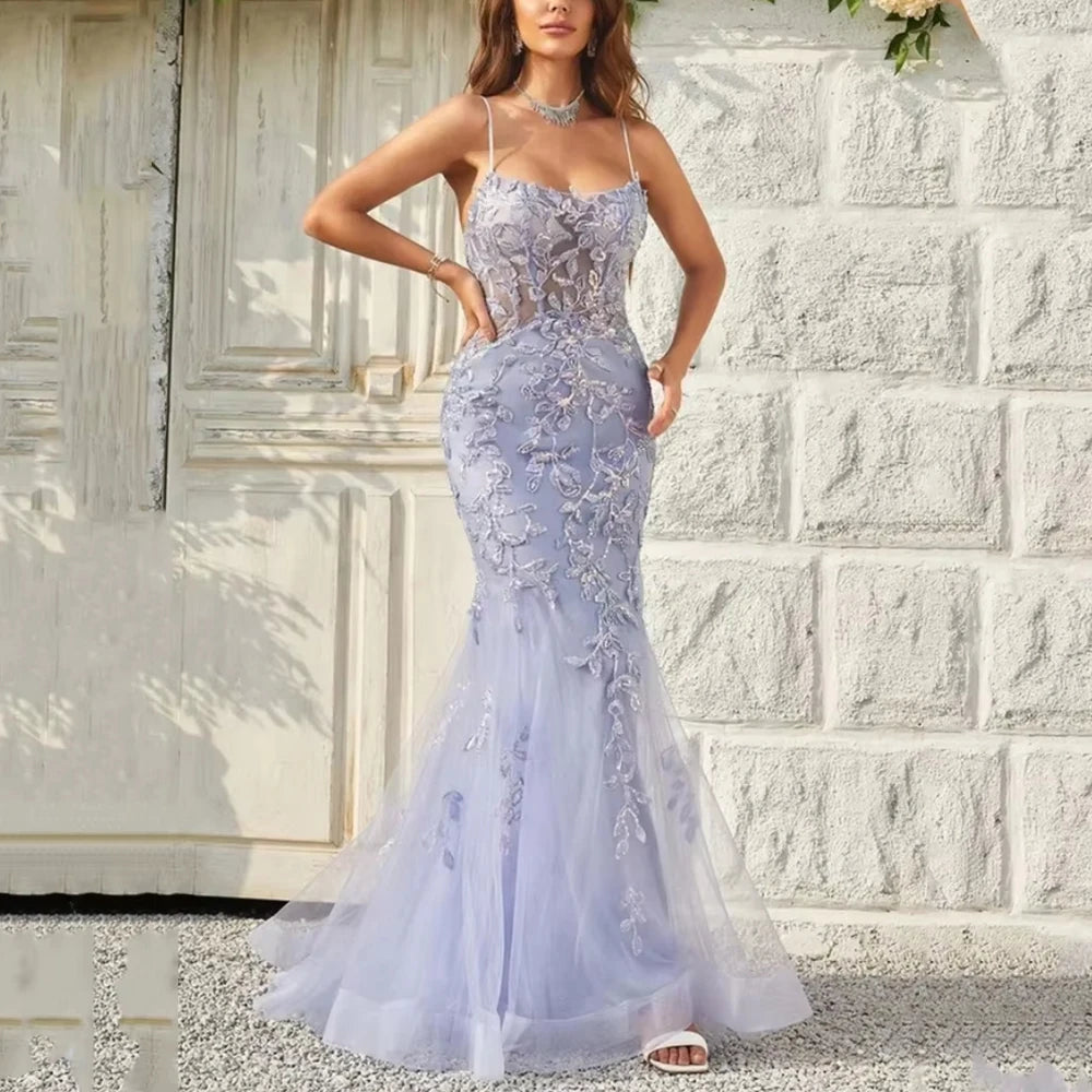 Lavender embroidered tulle formal gown with spaghetti straps and fitted mermaid skirt