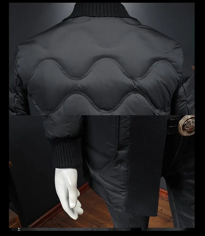Black mid-length puffer coat on mannequin, ribbed knit cuffs and wavy back quilting